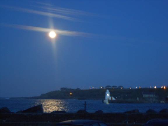 ighthouse at wick harbour at night